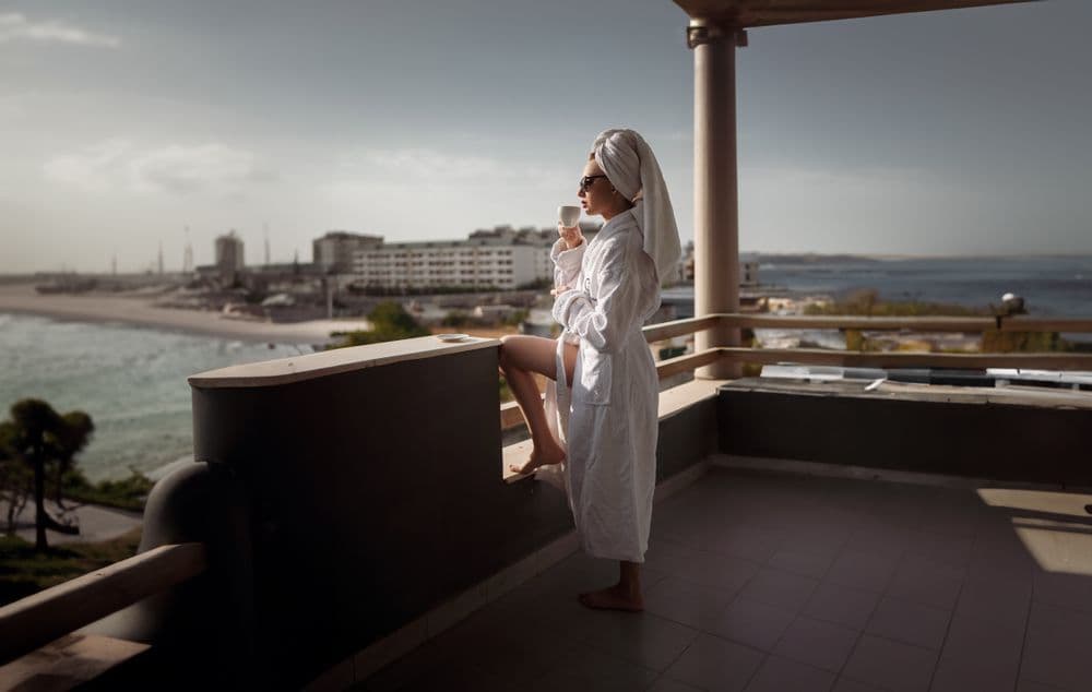 Beachfront balcony relaxation with ocean view