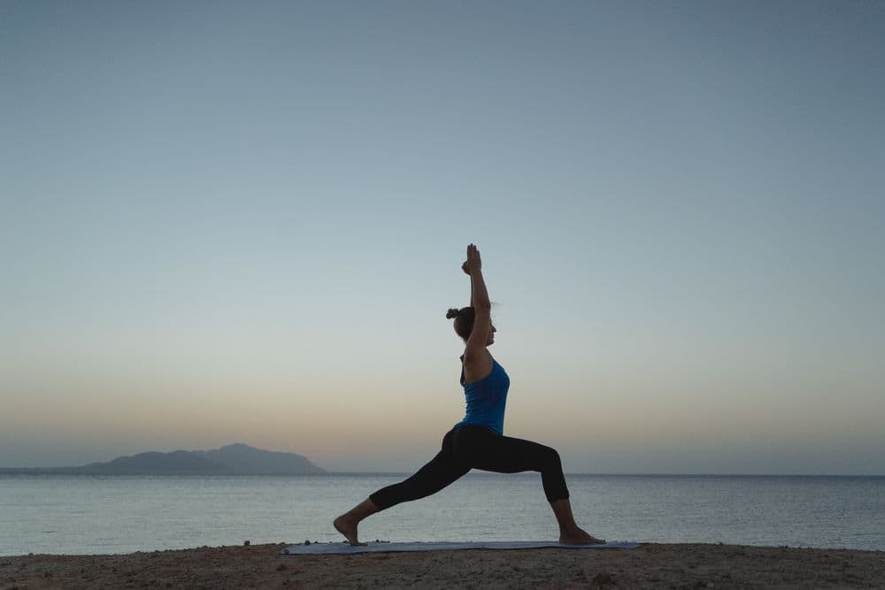 Yoga session on the beach